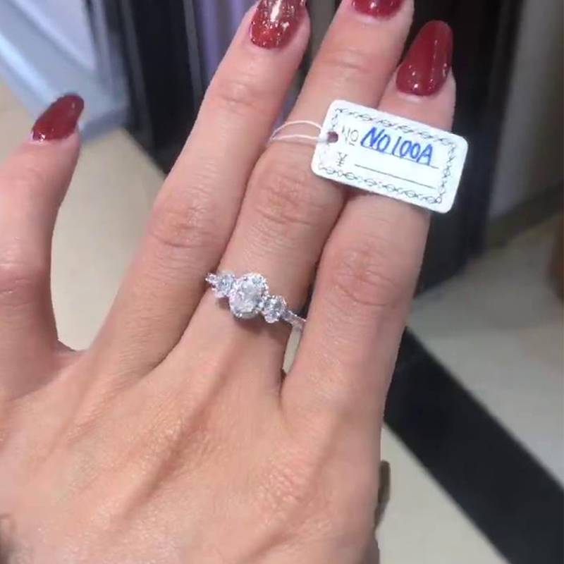 Egg shaped three stone round wrapped women's ring S925 silver plated platinum customized main stone moissanite diamond 0.5ct/secondary stone high carbon diamond
